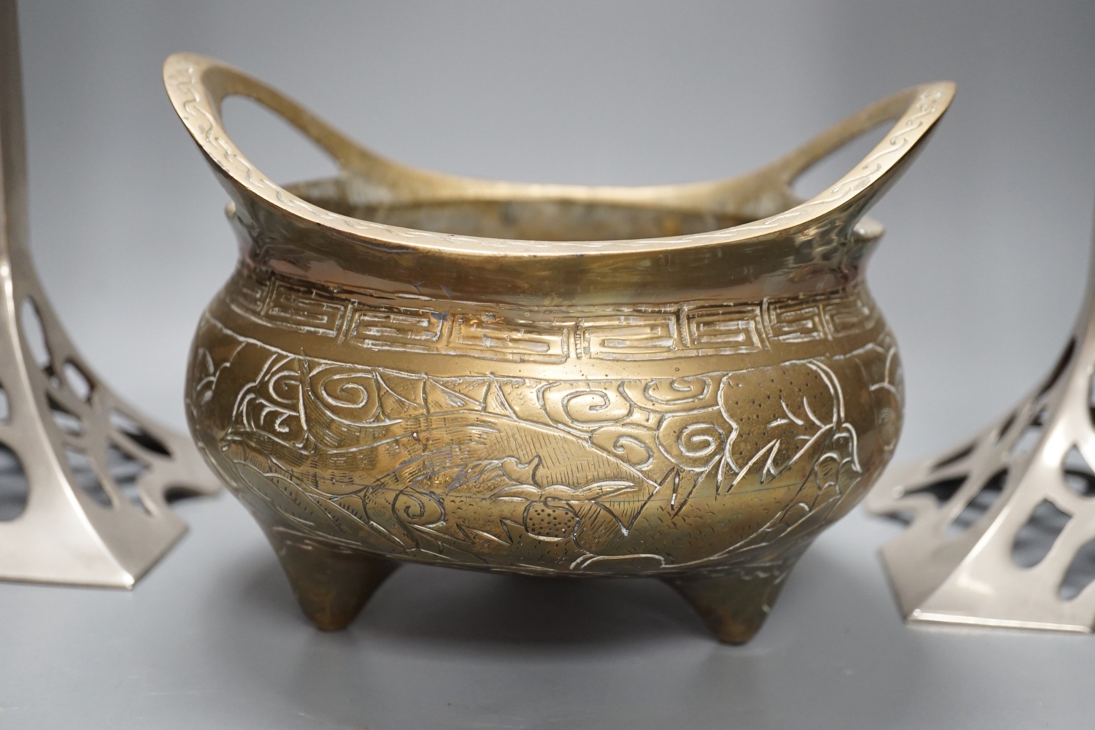 A bronze censer, a pair of secessionist style candle sticks and three other items, bronze censer 20 cms wide